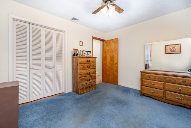 carpeted bedroom featuring a closet, ceiling fan, and baseboards