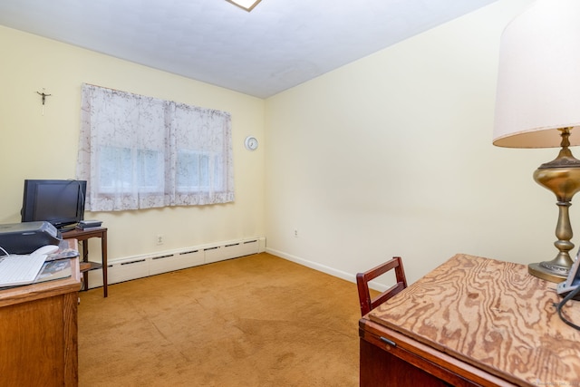 carpeted office featuring a baseboard heating unit and baseboards