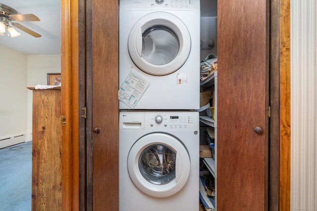 washroom featuring stacked washer / dryer and ceiling fan