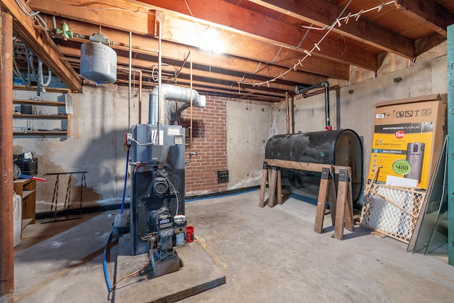unfinished below grade area with heating fuel and a heating unit