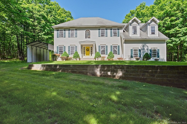 81 Red Barns Rd, Guilford, CT 06437 - view of front of property featuring a carport, a front yard, and a shingled roof