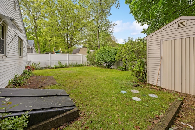 view of yard with a shed and an outdoor structure