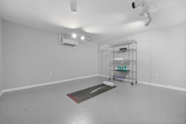 33 Carrington Dr, Stamford, CT 06831 - finished basement with track lighting and an AC wall unit