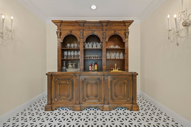 33 Carrington Dr, Stamford, CT 06831 - indoor dry bar with tile patterned floors and crown molding