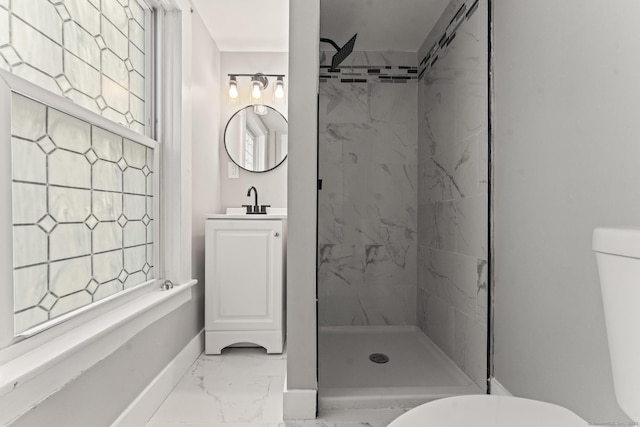 182 Rte 66, Columbia, CT 06237 - bathroom with marble look tiles, toilet, a marble finish shower, and vanity