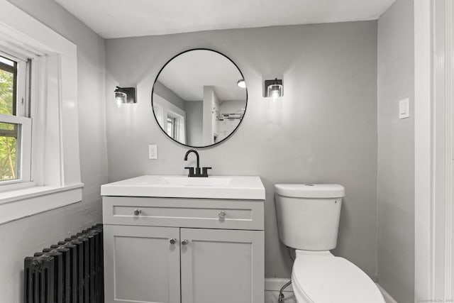 182 Rte 66, Columbia, CT 06237 - bathroom with radiator, toilet, and vanity