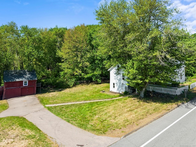 182 Rte 66, Columbia, CT 06237 - view of yard with a shed, an outbuilding, and a view of trees