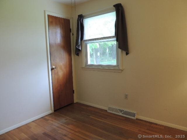 4 Balsam Rd, Wallingford, CT 06492 - empty room with wood finished floors and baseboards