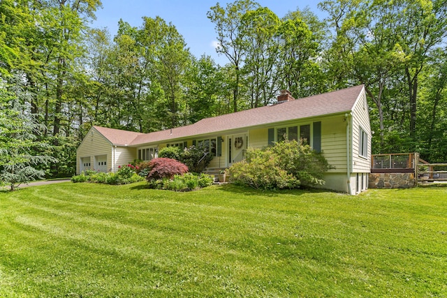 111 Deforest Rd, Wilton, CT 06897 - view of front of home with a chimney, a front yard, and an attached garage