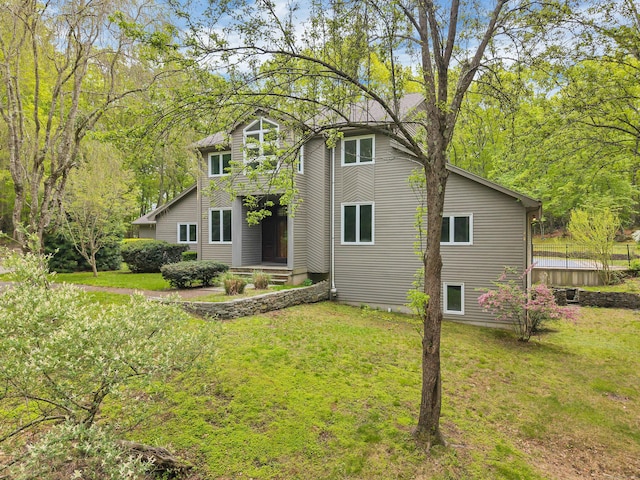 20A Bush Hill Dr, East Lyme, CT 06357 - rear view of property featuring a yard