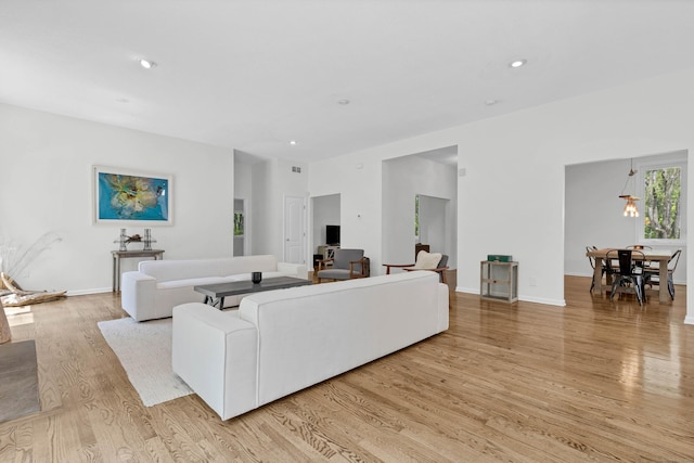 20A Bush Hill Dr, East Lyme, CT 06357 - living area featuring light wood finished floors, recessed lighting, and baseboards