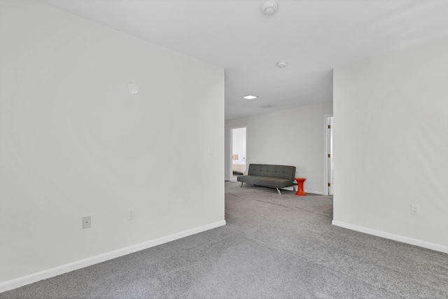 20A Bush Hill Dr, East Lyme, CT 06357 - spare room with carpet flooring, baseboards, and a smoke detector