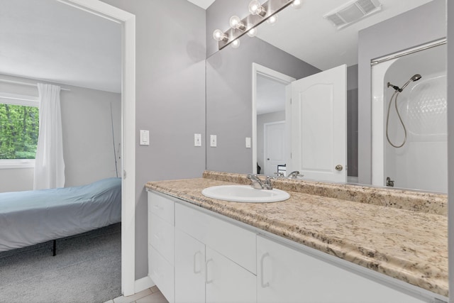 20A Bush Hill Dr, East Lyme, CT 06357 - ensuite bathroom featuring vanity and tile patterned flooring