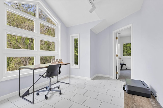 20A Bush Hill Dr, East Lyme, CT 06357 - home office featuring vaulted ceiling, baseboards, and light tile patterned floors