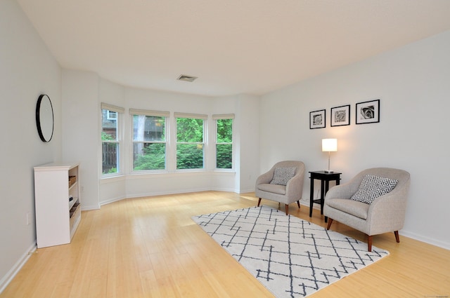 15 Highland St Apt 106, West Hartford, CT 06119 - sitting room featuring light wood-style floors and baseboards