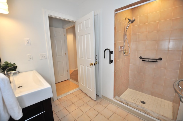 15 Highland St Apt 106, West Hartford, CT 06119 - full bath featuring a shower stall, tile patterned floors, and vanity