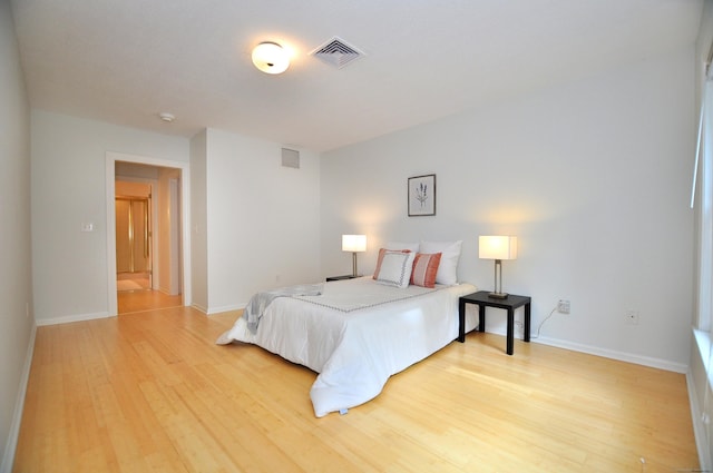 15 Highland St Apt 106, West Hartford, CT 06119 - bedroom with wood finished floors and baseboards