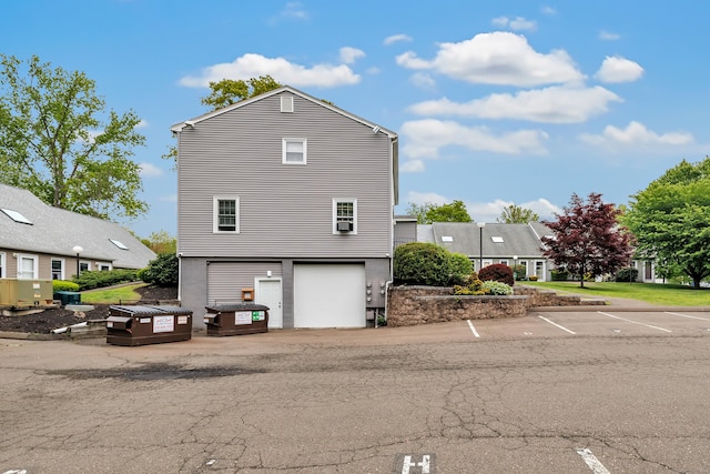 view of home's exterior with a garage