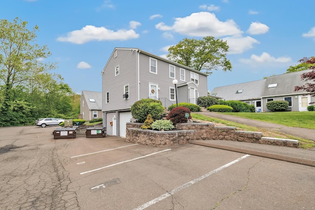 view of front of house featuring uncovered parking
