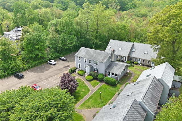 drone / aerial view of a heavily wooded area
