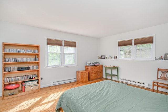3 Lambert Ln Unit 3, Brookfield, CT 06804 - bedroom featuring a baseboard radiator, baseboard heating, wood finished floors, and baseboards
