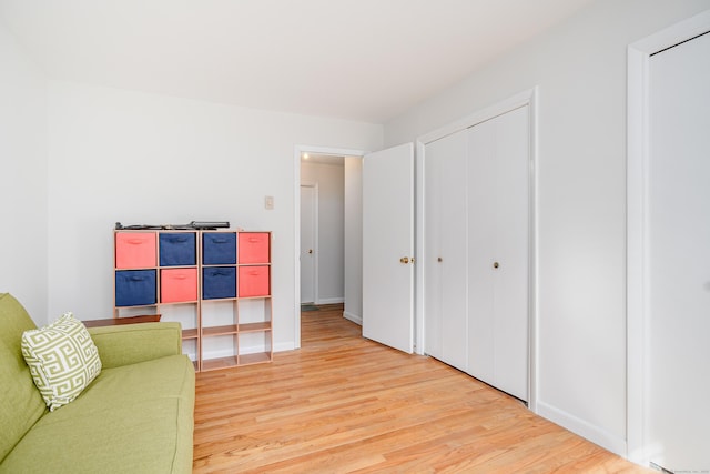 3 Lambert Ln Unit 3, Brookfield, CT 06804 - sitting room with light wood-style flooring and baseboards