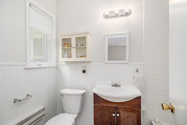 3 Lambert Ln Unit 3, Brookfield, CT 06804 - bathroom featuring baseboard heating, a wainscoted wall, toilet, and vanity