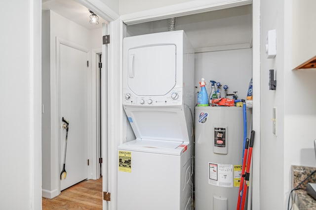 3 Lambert Ln Unit 3, Brookfield, CT 06804 - laundry room featuring water heater, estacked washer and dryer, and light wood-style floors