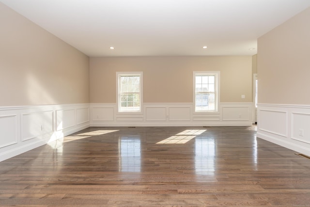 2 Stratton Farms Rd, Suffield, CT 06093 - empty room with a wainscoted wall, a decorative wall, wood finished floors, and recessed lighting
