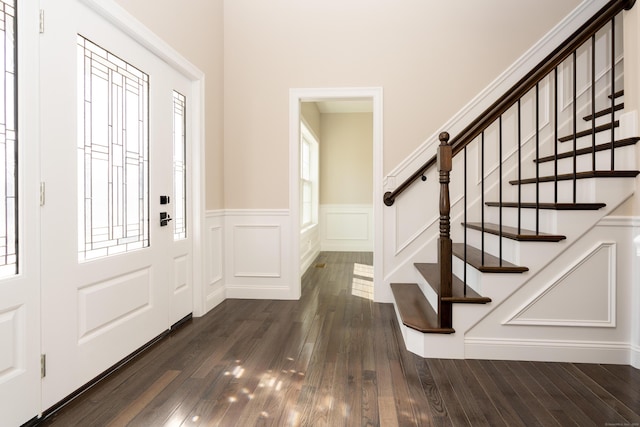 2 Stratton Farms Rd, Suffield, CT 06093 - entrance foyer with healthy amount of natural light, dark wood-style flooring, wainscoting, stairway, and a decorative wall
