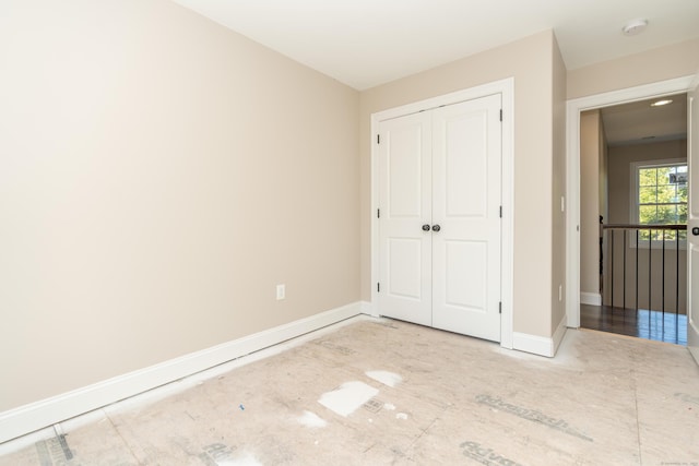 2 Stratton Farms Rd, Suffield, CT 06093 - unfurnished bedroom featuring a closet and baseboards