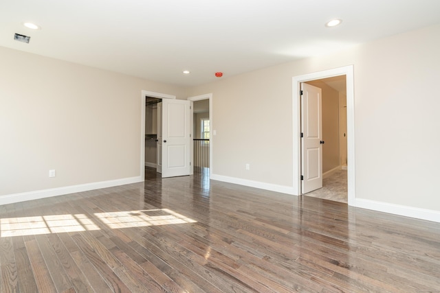 2 Stratton Farms Rd, Suffield, CT 06093 - unfurnished bedroom featuring wood finished floors, baseboards, recessed lighting, and a spacious closet