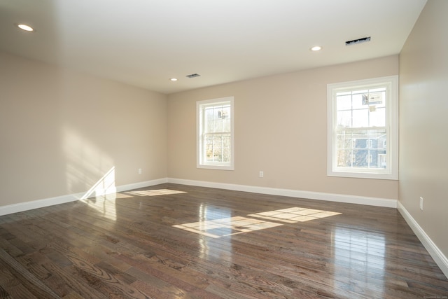2 Stratton Farms Rd, Suffield, CT 06093 - empty room featuring plenty of natural light, baseboards, wood finished floors, and recessed lighting