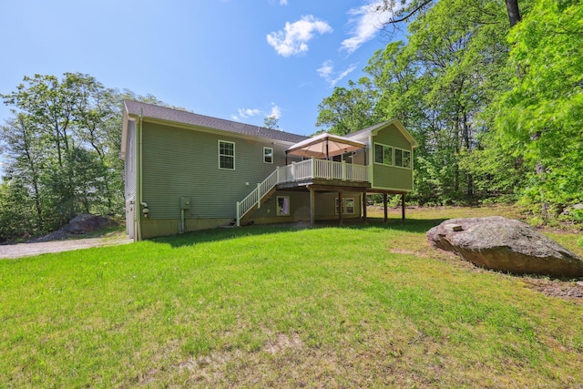 2 Red Fox Run, Wolcott, CT 06716 - back of property with a wooden deck, stairs, and a lawn