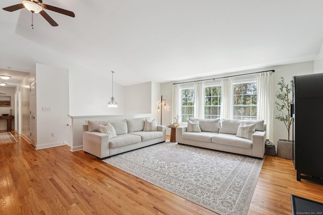 2 Red Fox Run, Wolcott, CT 06716 - living room with lofted ceiling, light wood-style flooring, a ceiling fan, and baseboards