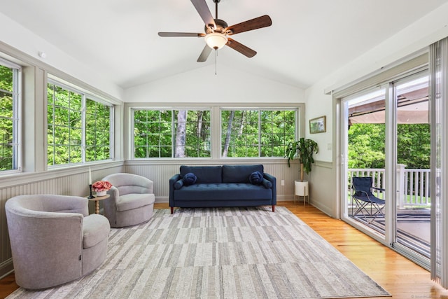 2 Red Fox Run, Wolcott, CT 06716 - sunroom / solarium featuring wood finished floors, vaulted ceiling, plenty of natural light, and a wainscoted wall