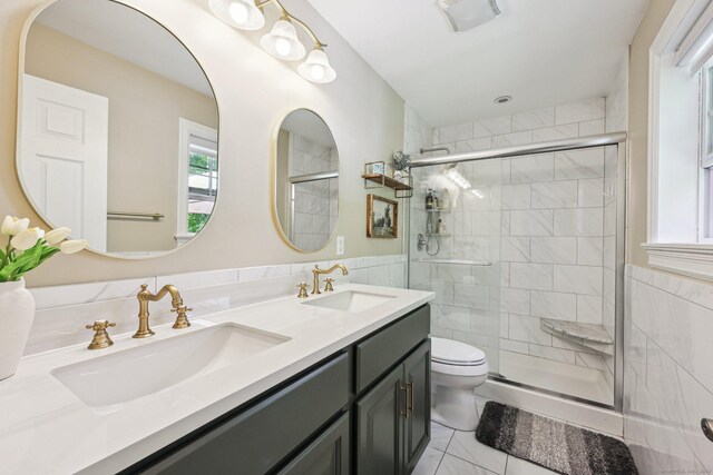 2 Red Fox Run, Wolcott, CT 06716 - bathroom featuring tile walls, a stall shower, toilet, and double vanity