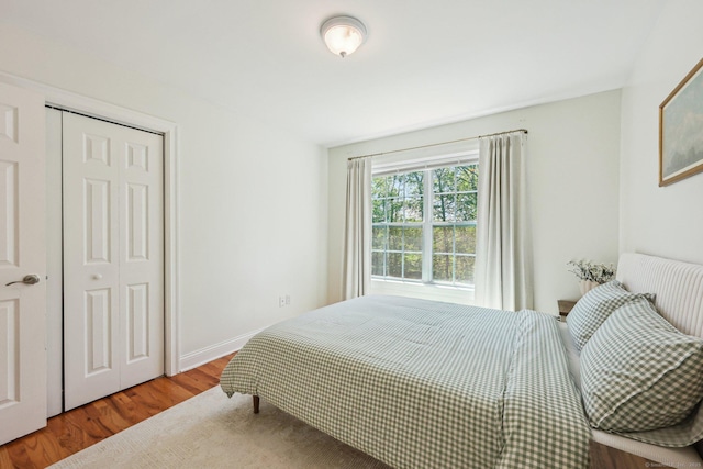 2 Red Fox Run, Wolcott, CT 06716 - bedroom featuring wood finished floors, a closet, and baseboards