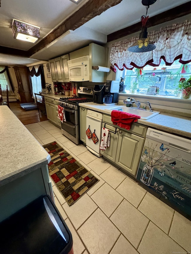 23 Old Mill Rd, Clinton, CT 06413 - kitchen featuring double oven range, white microwave, dishwashing machine, light tile patterned floors, and light countertops