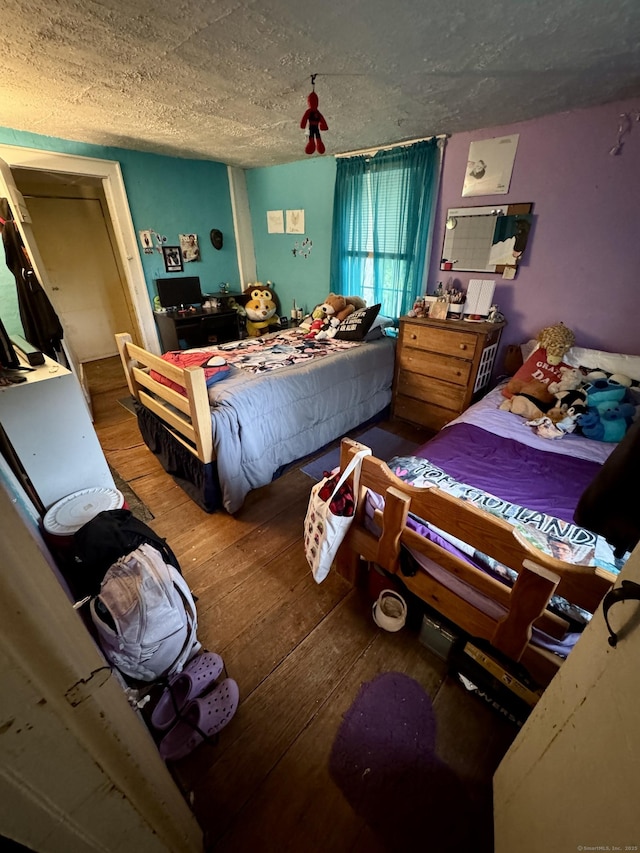 23 Old Mill Rd, Clinton, CT 06413 - bedroom featuring wood-type flooring and a textured ceiling