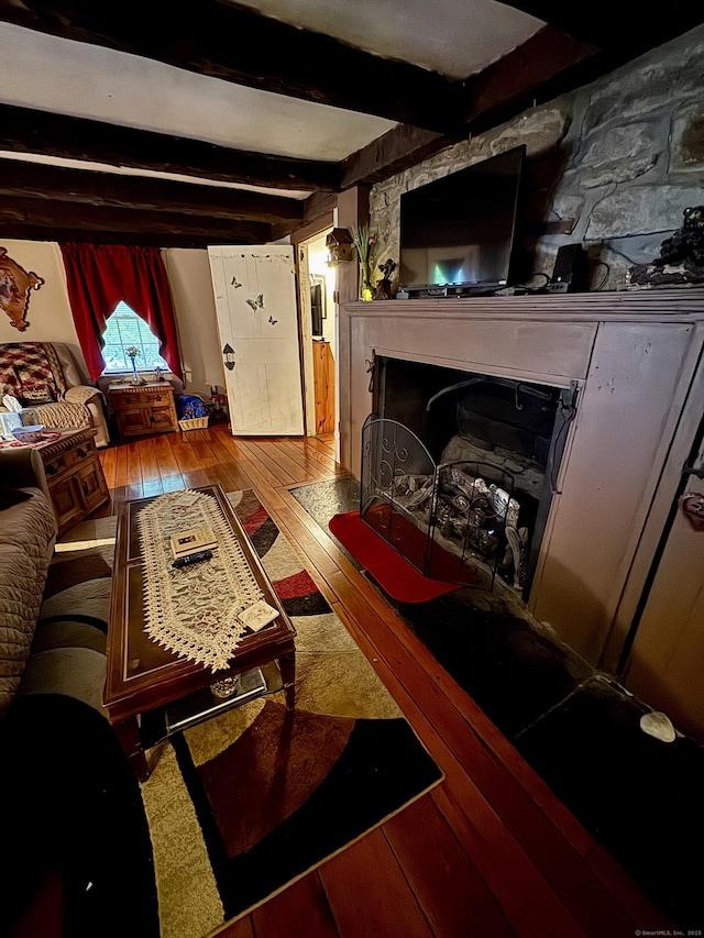 23 Old Mill Rd, Clinton, CT 06413 - living room with hardwood / wood-style floors, beam ceiling, and a fireplace