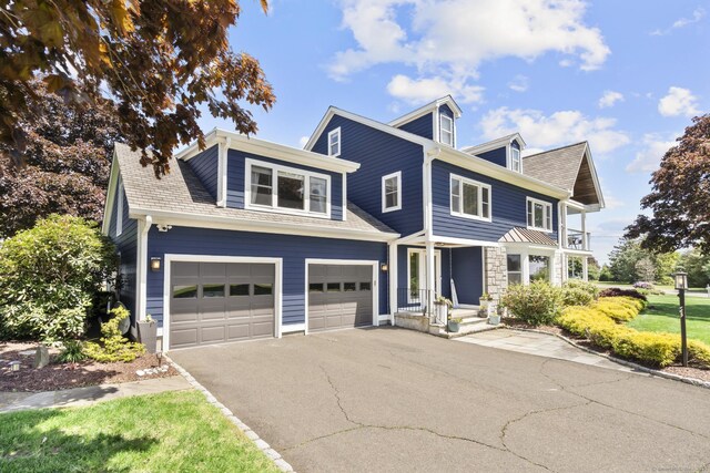 190 Bayview Blvd, Stratford, CT 06615 - view of front facade featuring asphalt driveway and a garage