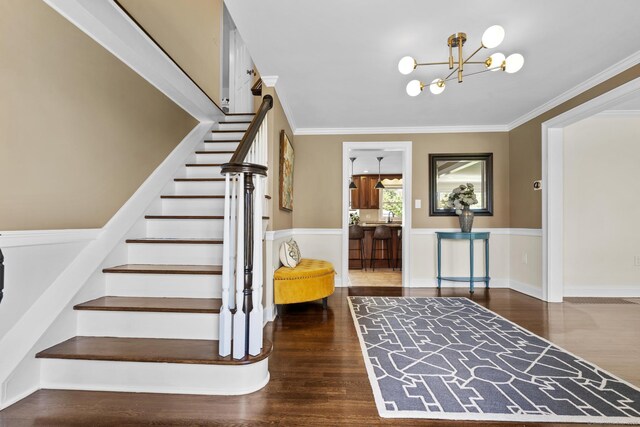 190 Bayview Blvd, Stratford, CT 06615 - staircase featuring wood finished floors, crown molding, and a chandelier
