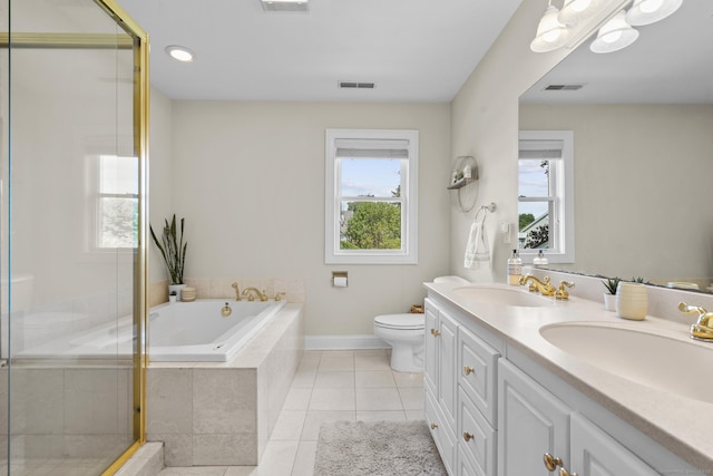 190 Bayview Blvd, Stratford, CT 06615 - bathroom featuring double vanity, a garden tub, plenty of natural light, and toilet