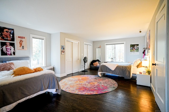 8 Bruce Ln, Avon, CT 06001 - bedroom featuring two closets, wood finished floors, and baseboards