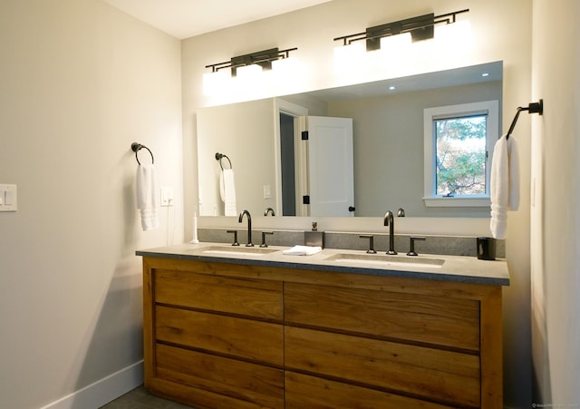 8 Bruce Ln, Avon, CT 06001 - bathroom featuring double vanity and baseboards