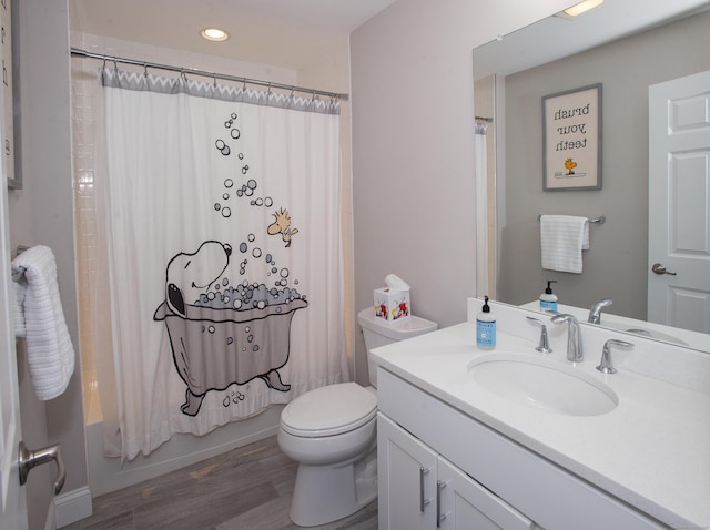 78 Copper Square Dr Unit 78, Bethel, CT 06801 - bathroom featuring vanity, toilet, shower / bath combo with shower curtain, wood finished floors, and recessed lighting