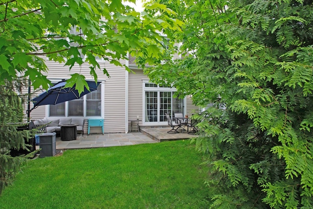 78 Copper Square Dr Unit 78, Bethel, CT 06801 - back of property featuring a patio and a yard
