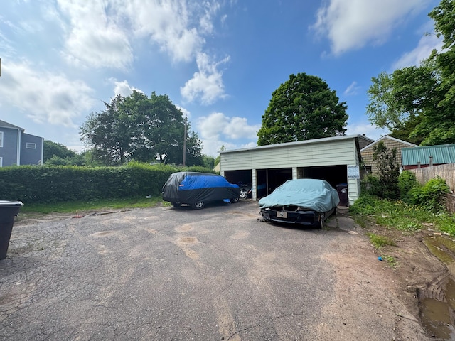view of parking featuring a carport