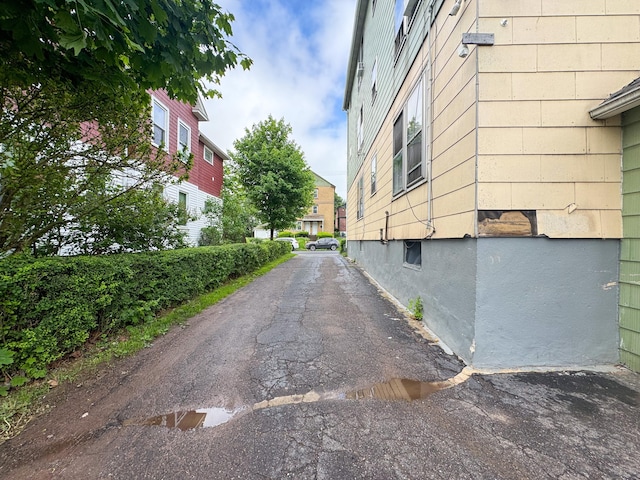 view of asphalt alley